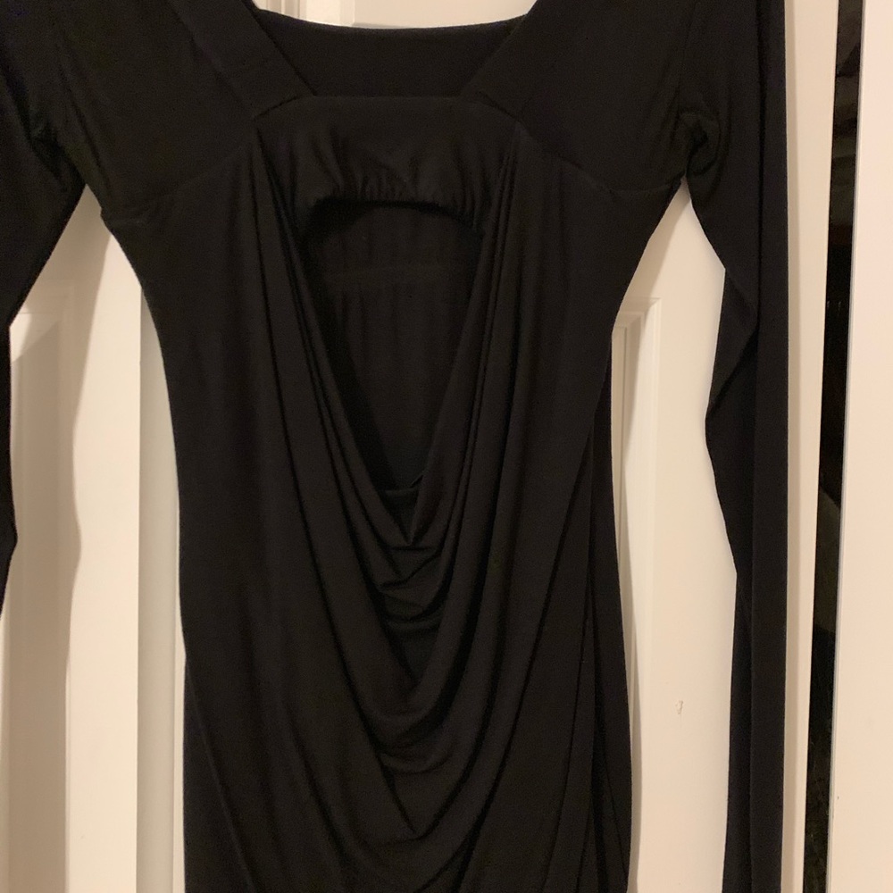 Black top with some open back detail.